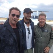 Patrick Hughes on-set with Harrison Ford and Arnold Schwarzenegger