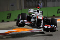 Kamui Kobayashi Airborne While Practicing For The 2011 Singapore Grand Prix