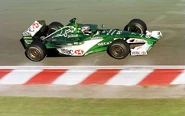 The Jaguar R1 driven by Eddie Irvine and Luciano Burti (7) and Johnny Herbert (8)