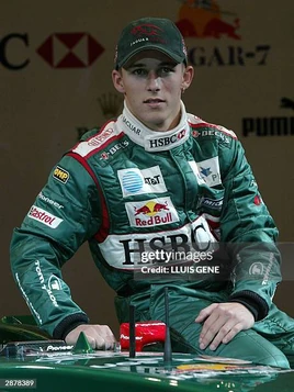 Jaguars-austrian-driver-christian-klien-poses-with-the-new-jaguar-r5-which-was-presented-today