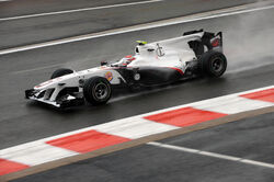 Kamui Kobayashi Racing In The Belgian Grand Prix 2010