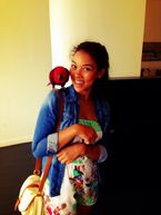 Tweeted by Alexandra: "Miss Scarlet the parrot and I in #nola. Girl tried to eat my sun glasses, and I almost let her little butt do it!".