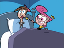 Wanda lifts Timmy from bed.