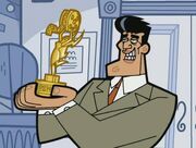  holding a Dimmy award.