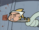 Timmy takes a bite of the chocolate.
