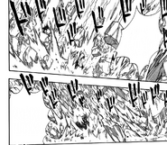 Natsu being hit by a barrage of earth