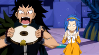 Gajeel wanting to eat the clock part