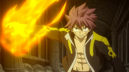 Natsu stops Franmalth's attacks