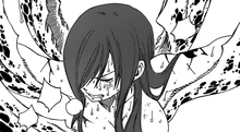 Erza sendo torturada.