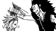 Gajeel pats Levy's head