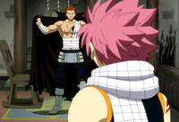 Gildarts shows Natsu the damage