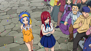 Levy with Erza who is praised for her achievements