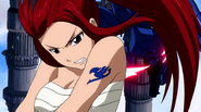 Erza continues attacking