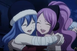 Meredy y Juvia felices por el fin de la batalla