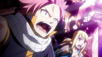 Lucy and Natsu watching Byro cast Divine Arrow