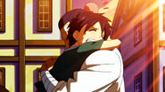 Macao hugs his son, Romeo