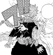 Zeref stabs Natsu.