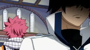 Natsu listens to Gray's story about someone who saw a dragon