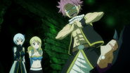 Yukino watches as Natsu threatens the Garou Knights