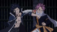 Natsu and Gray punch each other