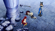 Erza looks at the wounded Kagura