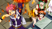 Natsu burns Flare's hair