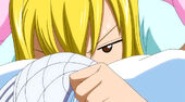 Natsu's scarf in Lucy's bed