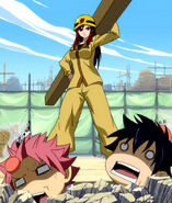 Gray is whacked by Erza