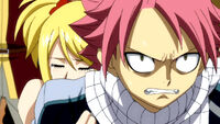 Lucy telling Natsu to keep control