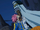 Natsu bites Brain as he drags him.png