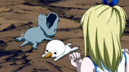 Lucy defeats a Lizardman using Plue