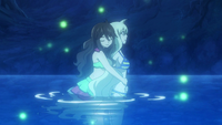 Zera hugs Mavis in the lake