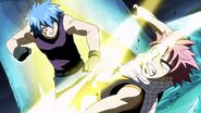 Natsu punched by Jellal