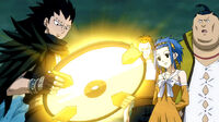 Gajeel and co see the Clock Part glow