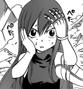 Erza looks at her childish appearance