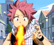 Loke in Natsu's body drooling fire