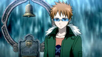 Loke stands next to Karen's grave