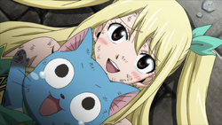 Lucy y Happy reciben a Natsu