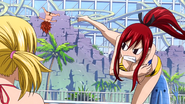 Lucy sees Erza kick Ichiya