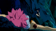 Natsu punched by Gray