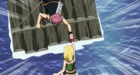 Lucy tries to save Natsu