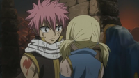 Natsu Consoles Lucy