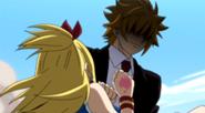 Loke saves Lucy