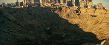 The crater left by the explosion.