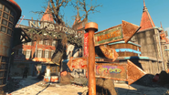 Navigation sign, with the Nuka-Cade in the back