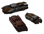 Three sprites from Fallout and Fallout 2, showing wrecked original Corvegas