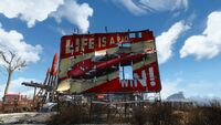 Cherry Bomb billboard outside of the property