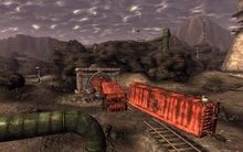 Wrecked trains in the tunnel blocked by Elijah's escape.