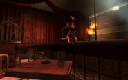 A stripper doing a pole dance in the Omerta's Casino