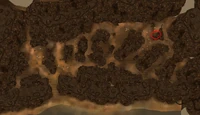 Deathclaw promontory overhead view in GECK. Dead power armor prospectors circled in red. North is left in the image